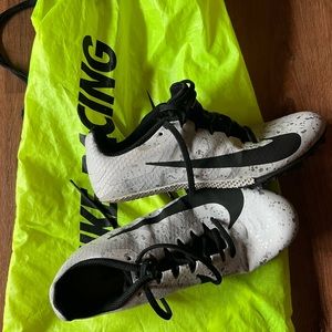 Nike track shoes- worn once. US size 5.5. Like new.